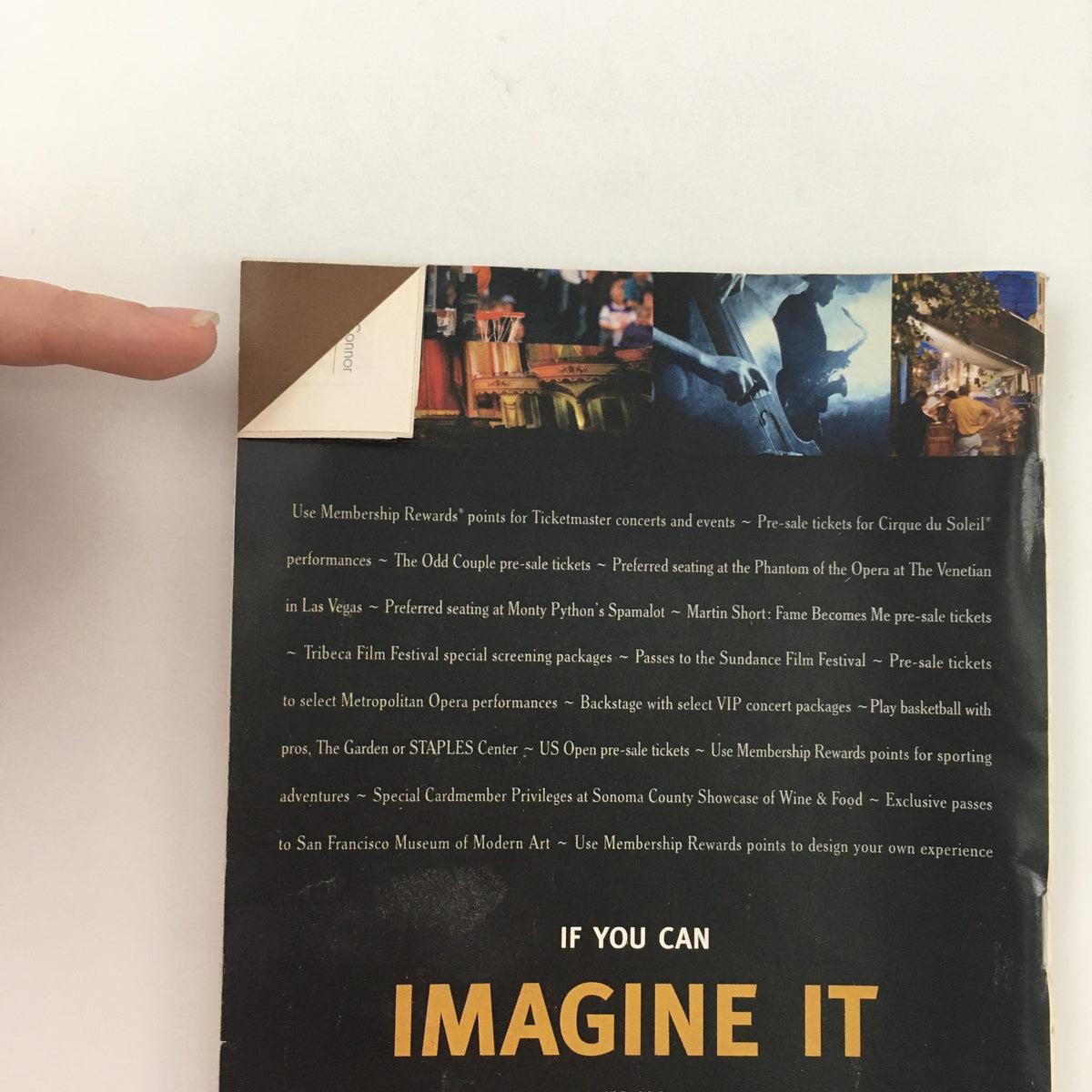 Close-up of the back cover of the 2006 Playbill for 'Awake and Sing!' by Clifford Odets, showcasing a hand pointing to a folded corner and information on membership rewards.