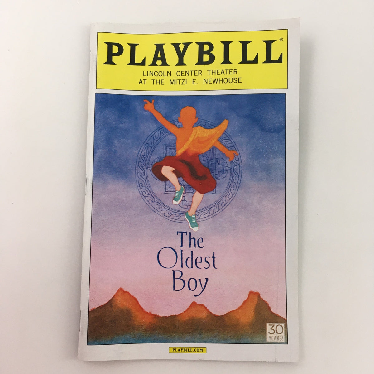 2014 Playbill for 'The Oldest Boy' by Sarah Ruhl, featuring a colorful cover illustration depicting a dancer at the Mitzi E. Newhouse Theater.