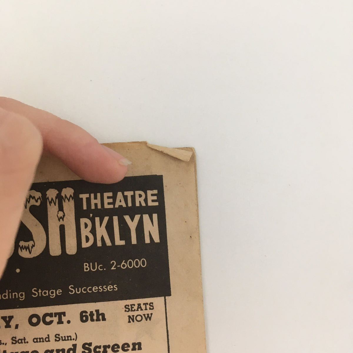 1943 Flatbush Theatre Bklyn 'Native Son' by Paul Green & Richard Wright, featuring a close-up of the theatre's promotional flyer with details about the show, highlighting minor wear and a bent corner.
