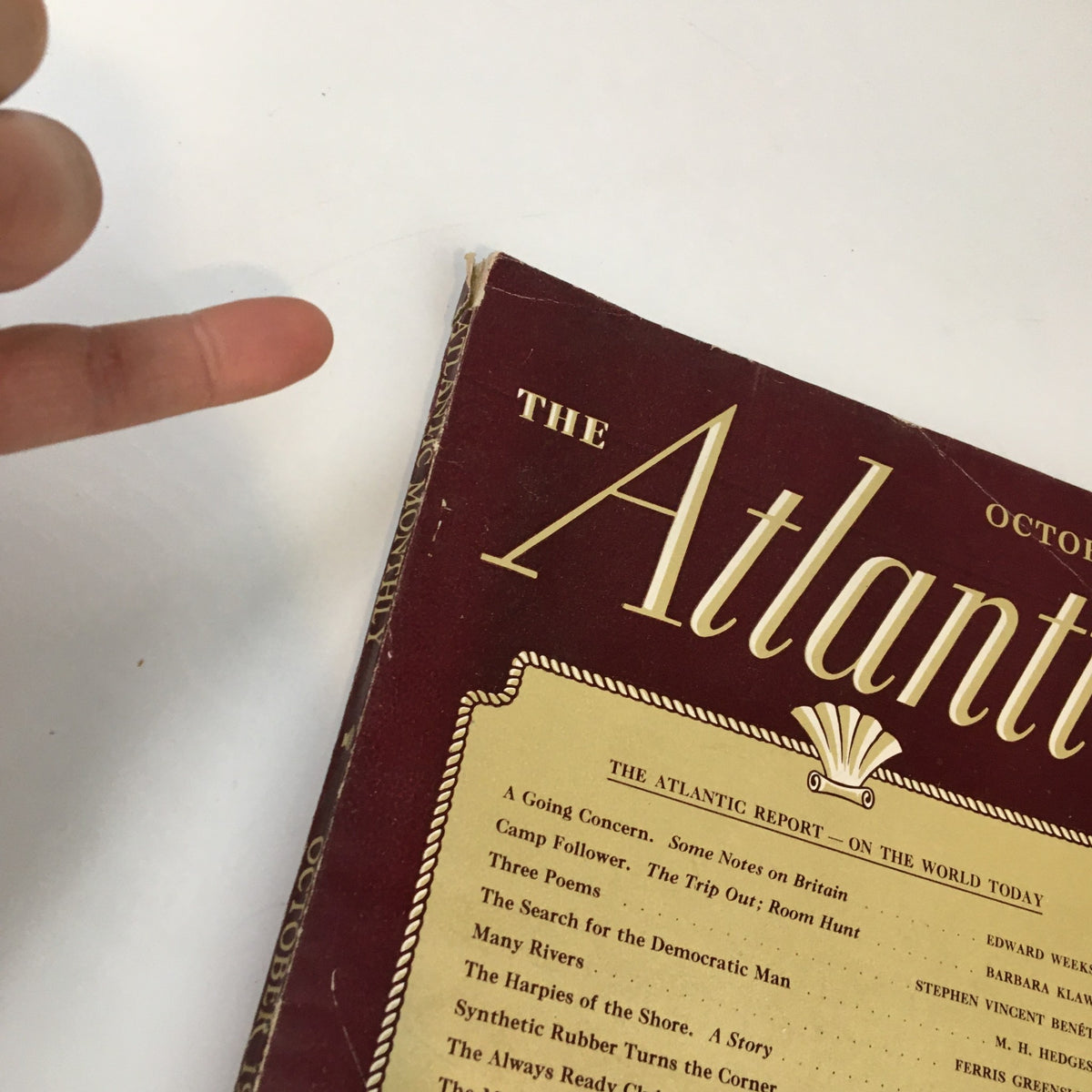 Close-up of the cover of the October 1943 VTG The Atlantic Magazine highlighting the title and text layout, reflecting vintage design elements.