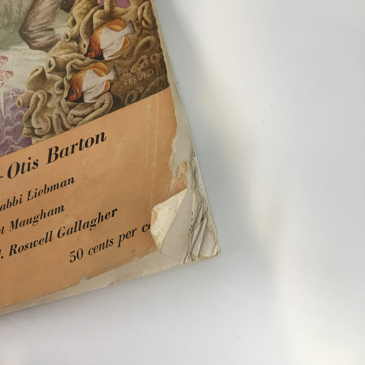 Close-up of the worn cover of VTG The Atlantic Magazine June 1948, showcasing the title 'Hunting Undersea' by Otis Barton, highlighting its vintage appeal and minor damage.