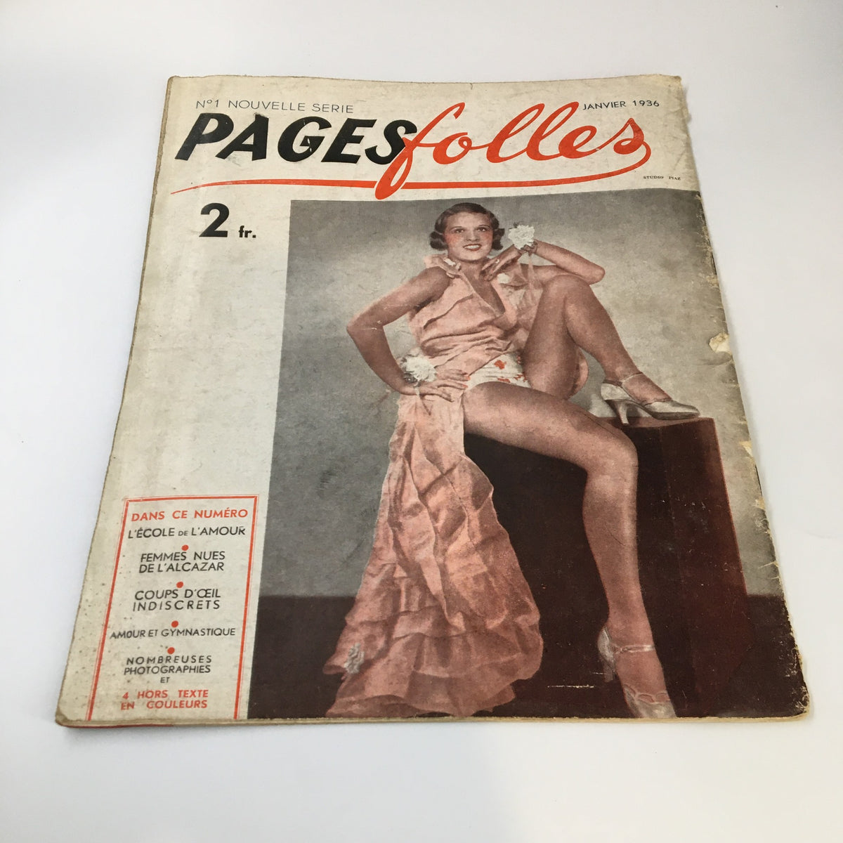 Cover of VTG Pages Folles Magazine January 1936 showcasing a glamorous model dressed in an elegant gown, capturing the vintage style of the 1930s.