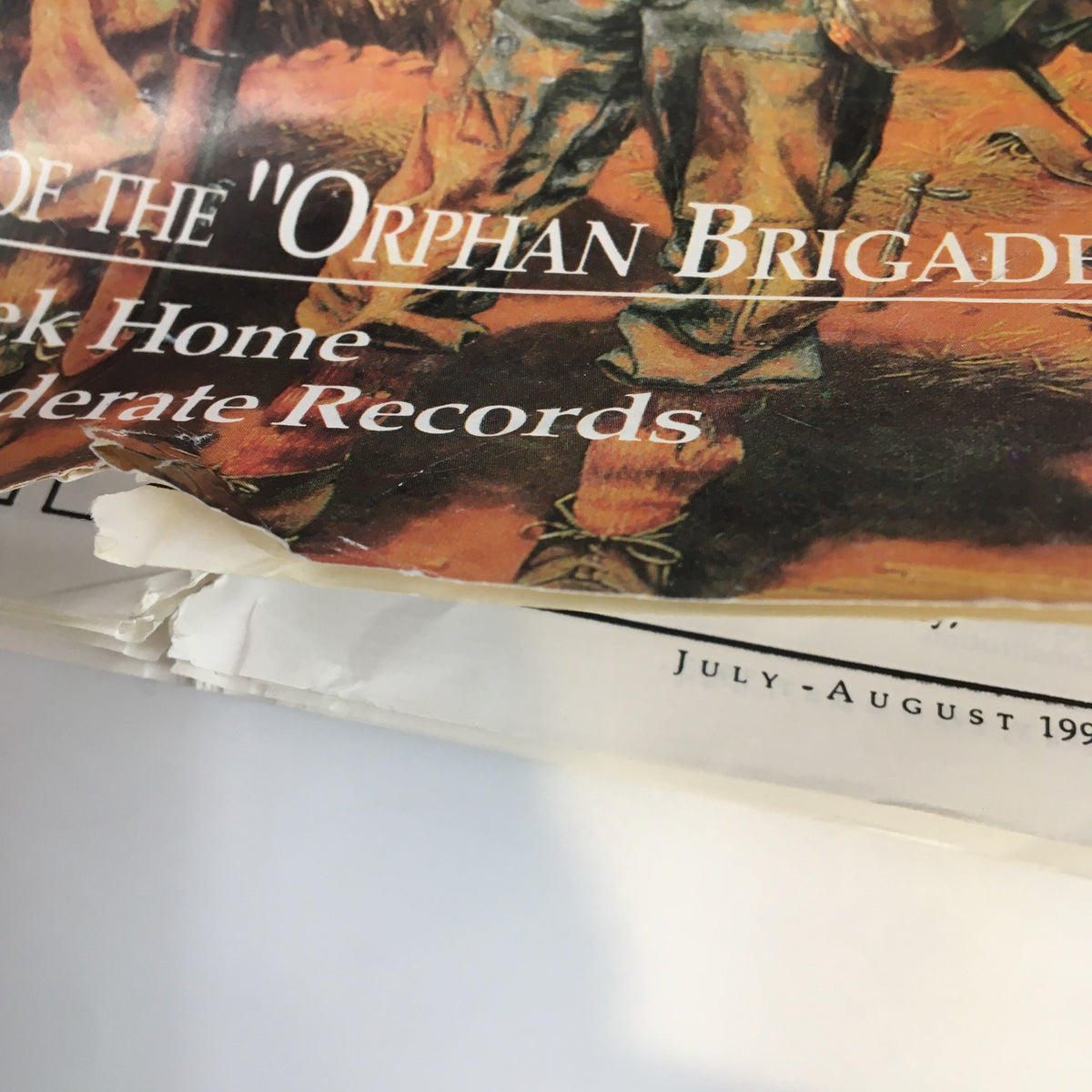 Close-up view of the cover of the July 1993 Confederate Veteran Magazine, focusing on the theme 'Color-Bearers of the Orphan Brigade'.