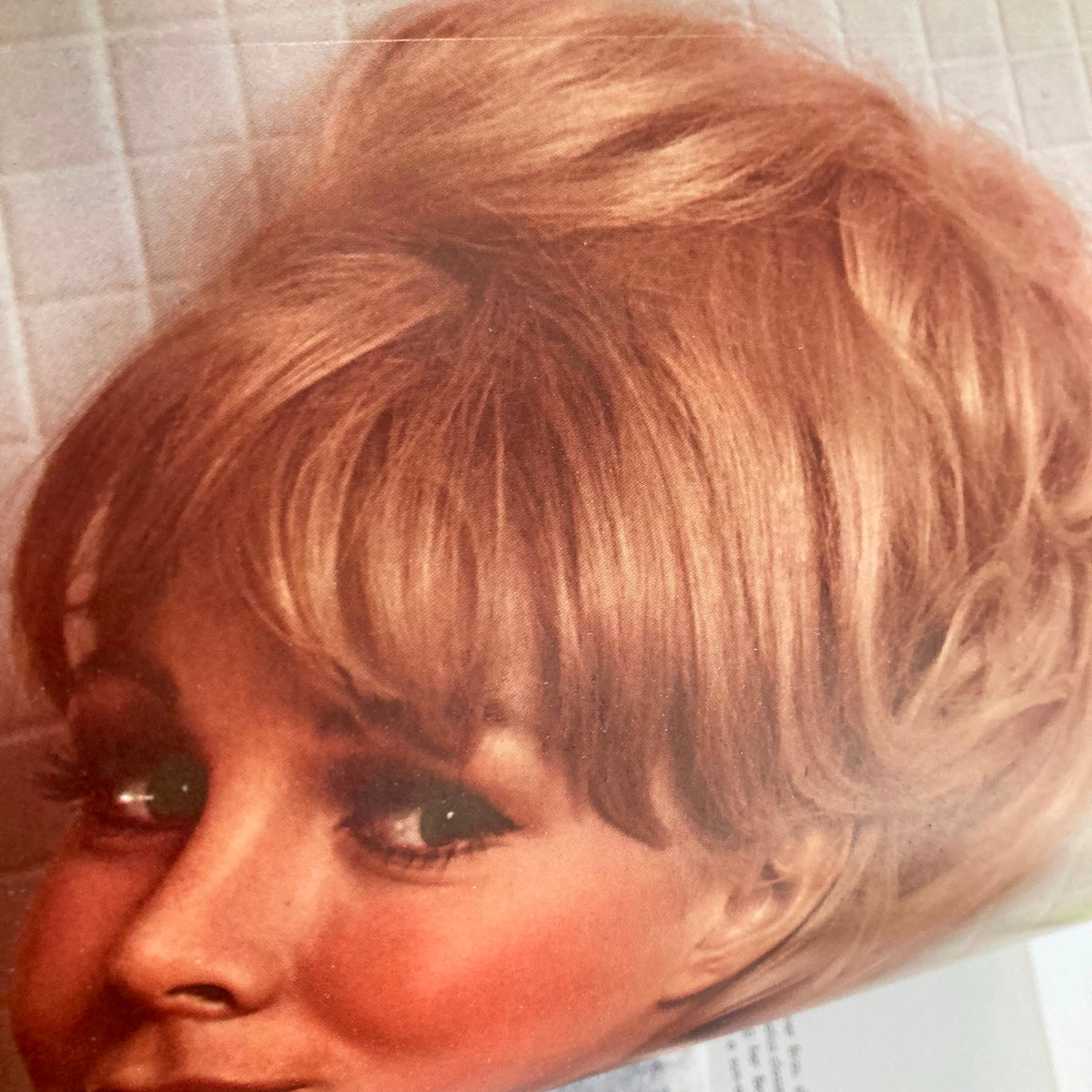 Close-up portrait of a woman with blonde hair from the VTG Playboy Magazine August 1966 featuring Playmate Susan Denberg.