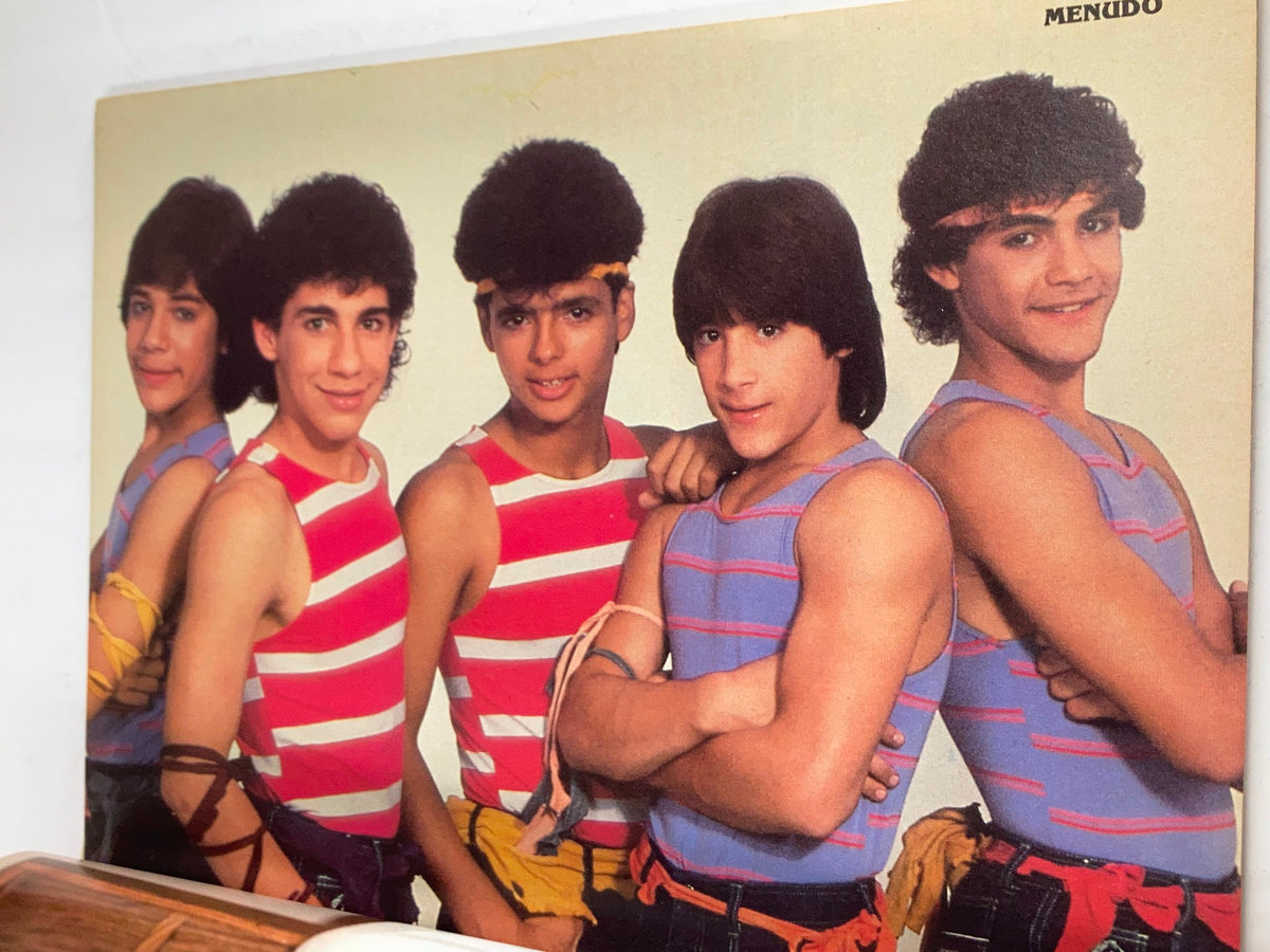 Image from VTG Teen Machine Magazine December 1985 Vol 6 #4 featuring a group of young male models in colorful outfits, reflecting the vibrant fashion of the 1980s.