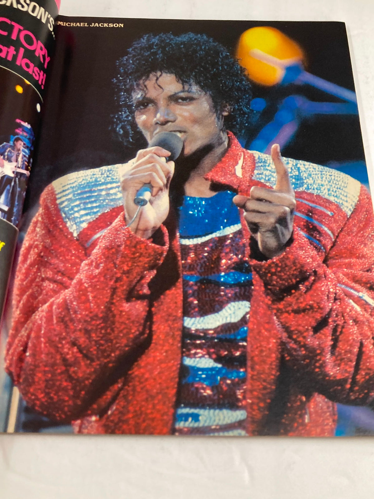 Iconic performance image of Michael Jackson from the VTG Teen Machine Magazine December 1985 Vol 6 #4, showcasing his signature glittery outfit while singing.