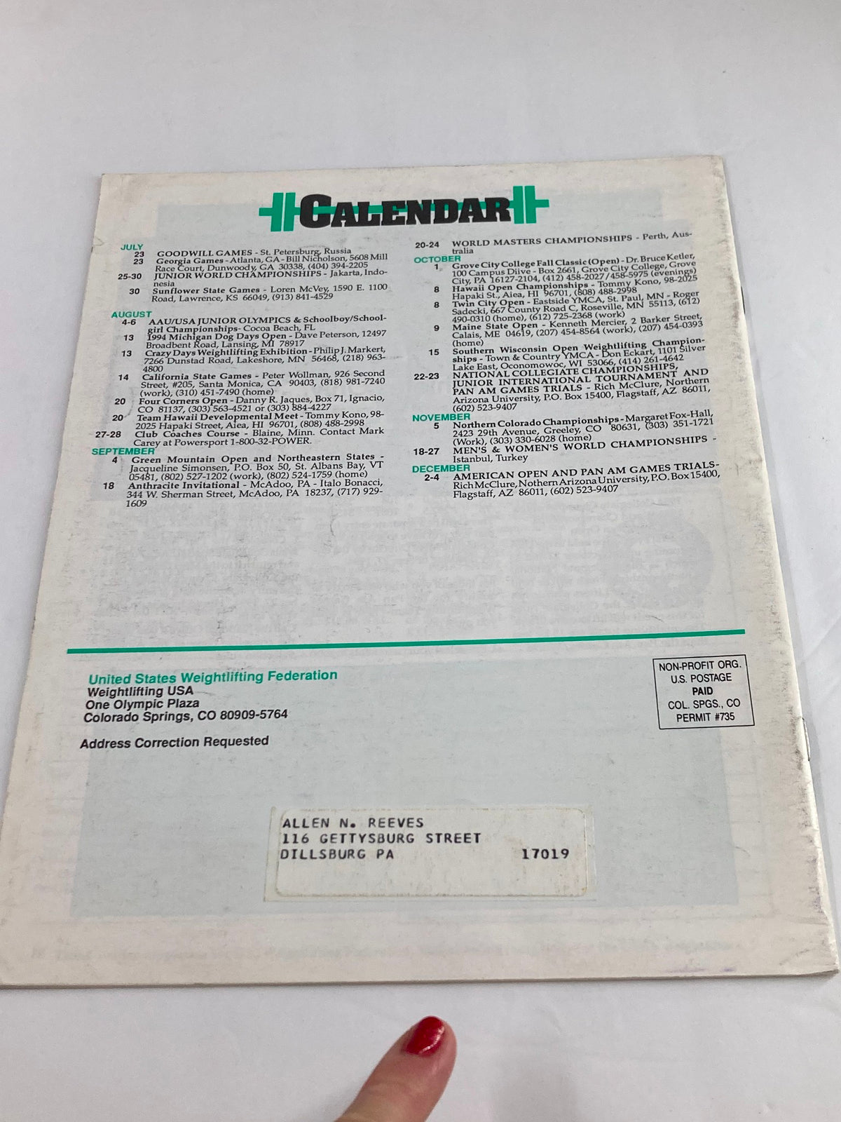 Back cover of Weightlifting USA Magazine Vol 12 #3 July 1994 displaying the calendar of upcoming weightlifting events and information from the United States Weightlifting Federation.
