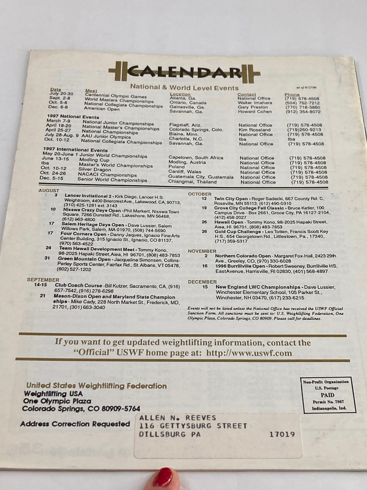 Back cover of Weightlifting USA Magazine Vol 14 #3 July 1996 Olympic Games Preview featuring a calendar of national and world-level weightlifting events, including dates and locations, published by the United States Weightlifting Federation.