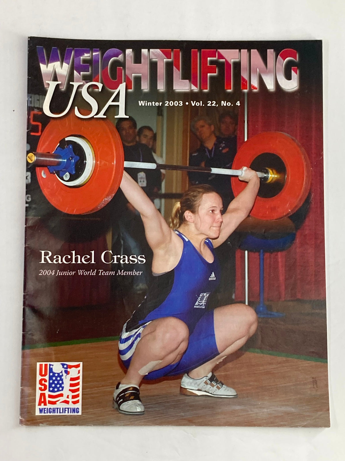 Cover of Weightlifting USA Magazine Vol 22 #4 Winter 2003 featuring Rachel Crass, 2004 Junior World Team Member, showcasing her in action during a weightlifting competition.