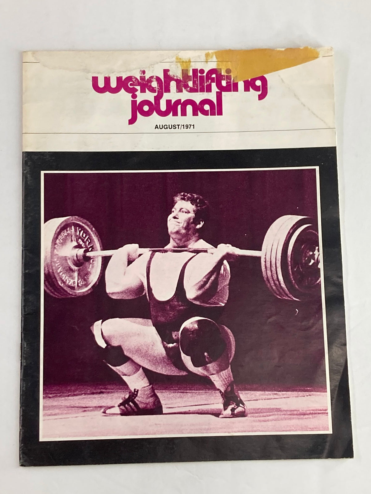 Cover of the VTG Weightlifting Journal Magazine August 1971 featuring a weightlifter in action, showcasing vibrant retro design.