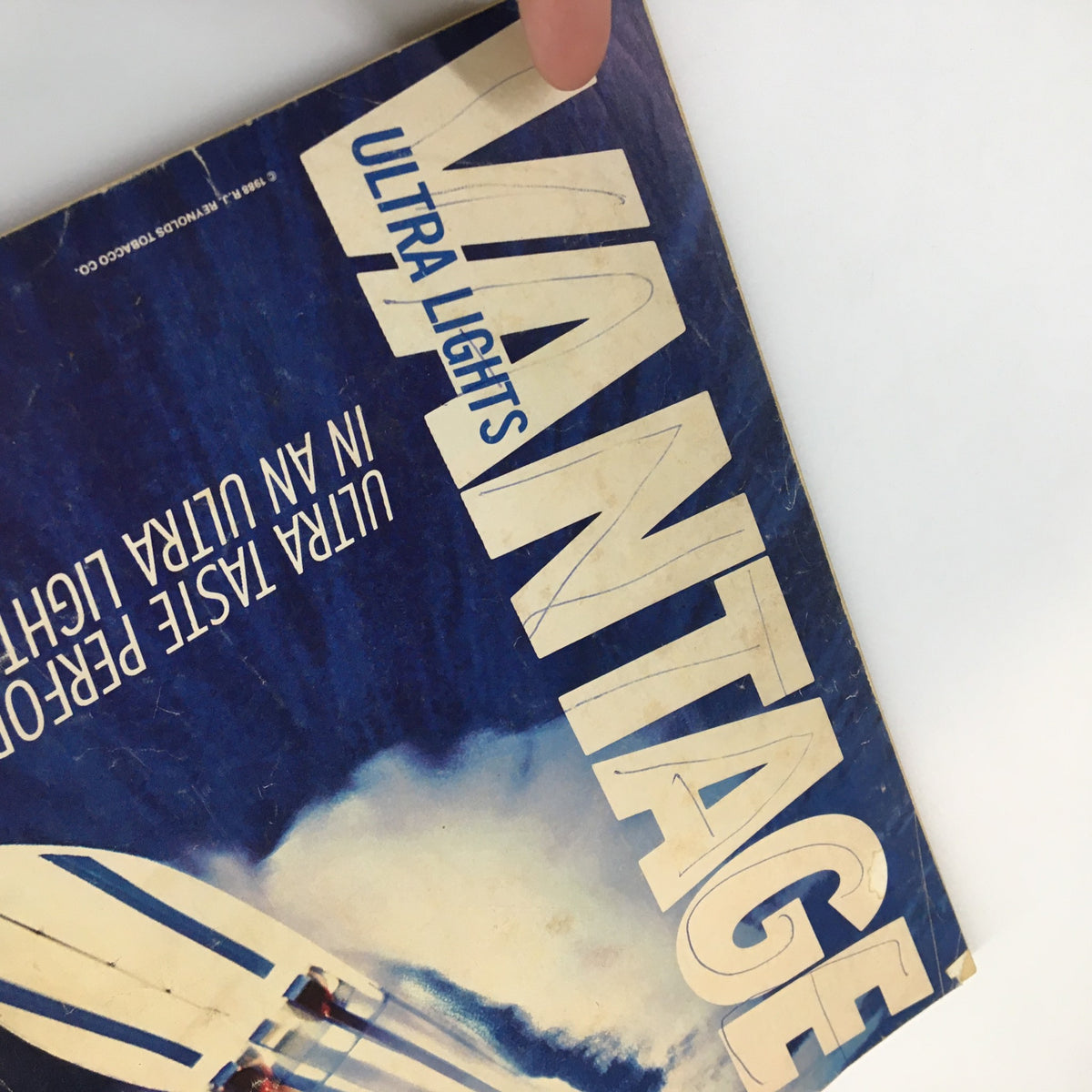 Cover page of VTG True Story Magazine August 1988 with a bold advertisement for Vantage Ultra Lights, featuring an eye-catching blue background and vintage imagery. This image reflects the cultural aesthetics of the 1980s era.