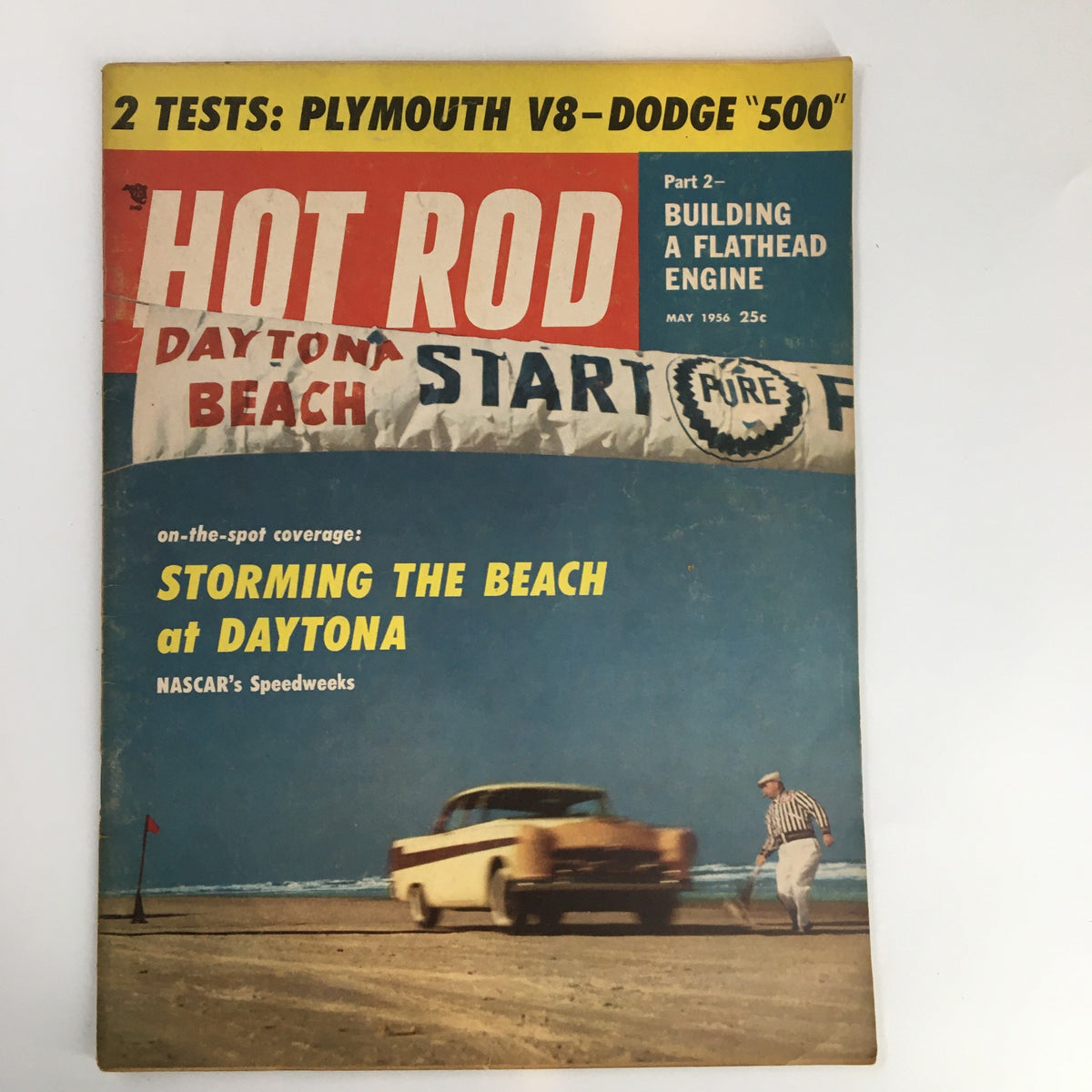 Cover of VTG Hot Rod Magazine May 1956 featuring the article 'Storming The Beach at Daytona', showcasing nostalgic car culture and beach racing.