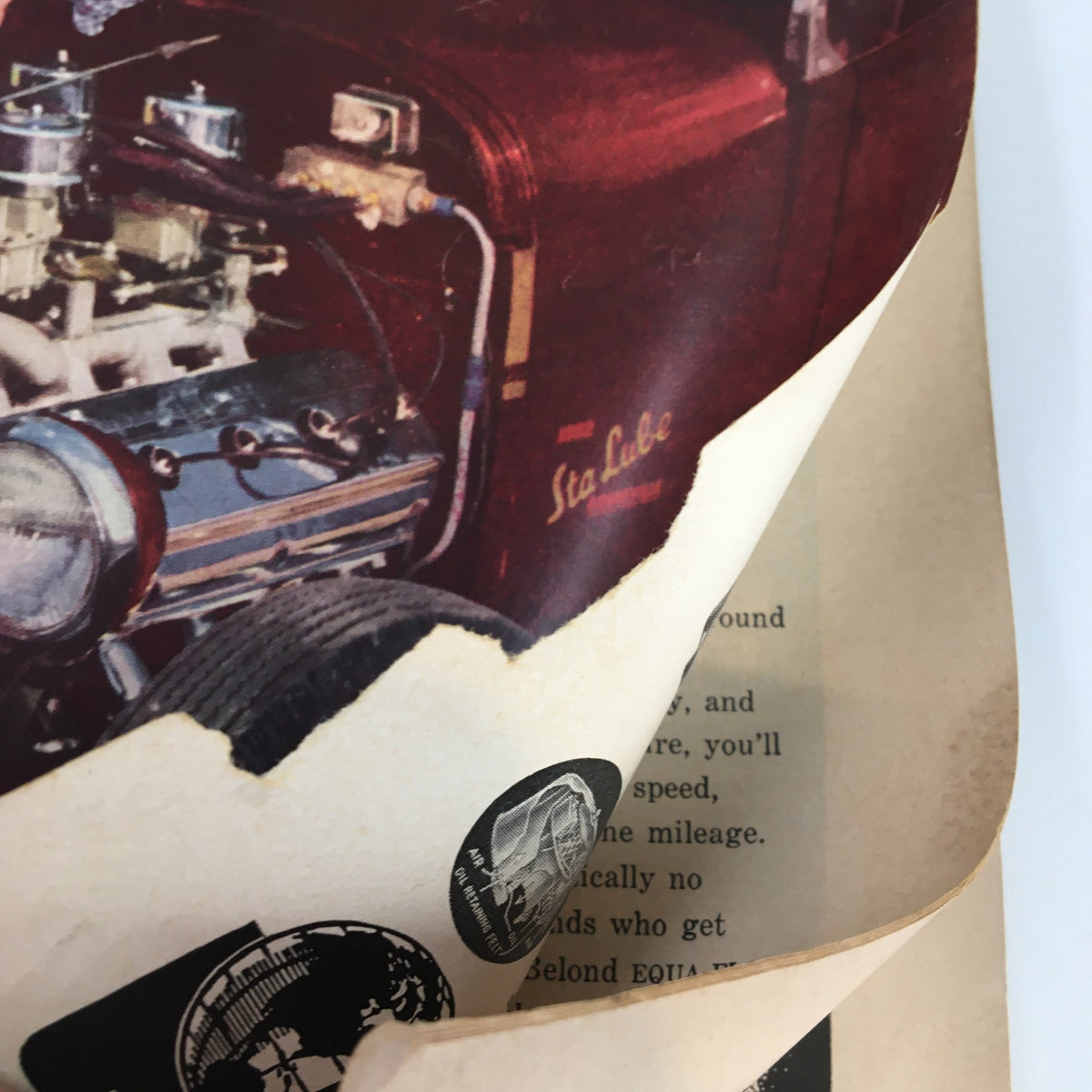 Detail of VTG Hot Rod Magazine March 1953 showcasing engine components and magazine corner.