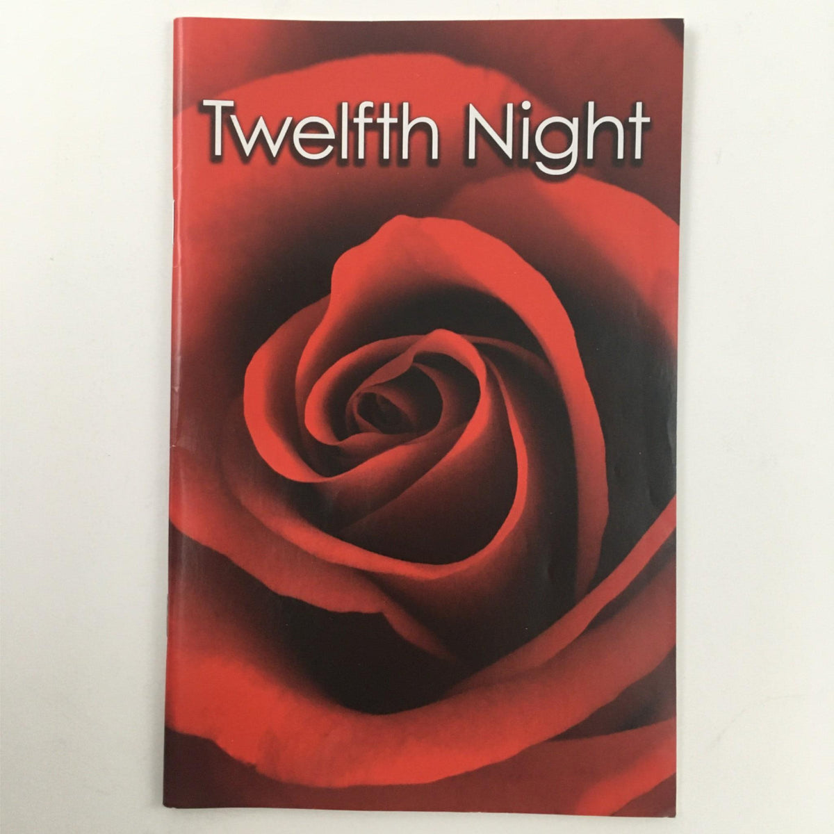 Cover of the 2009 Twelfth Night at McCarter Theatre Center by William Shakespeare featuring a rose design.