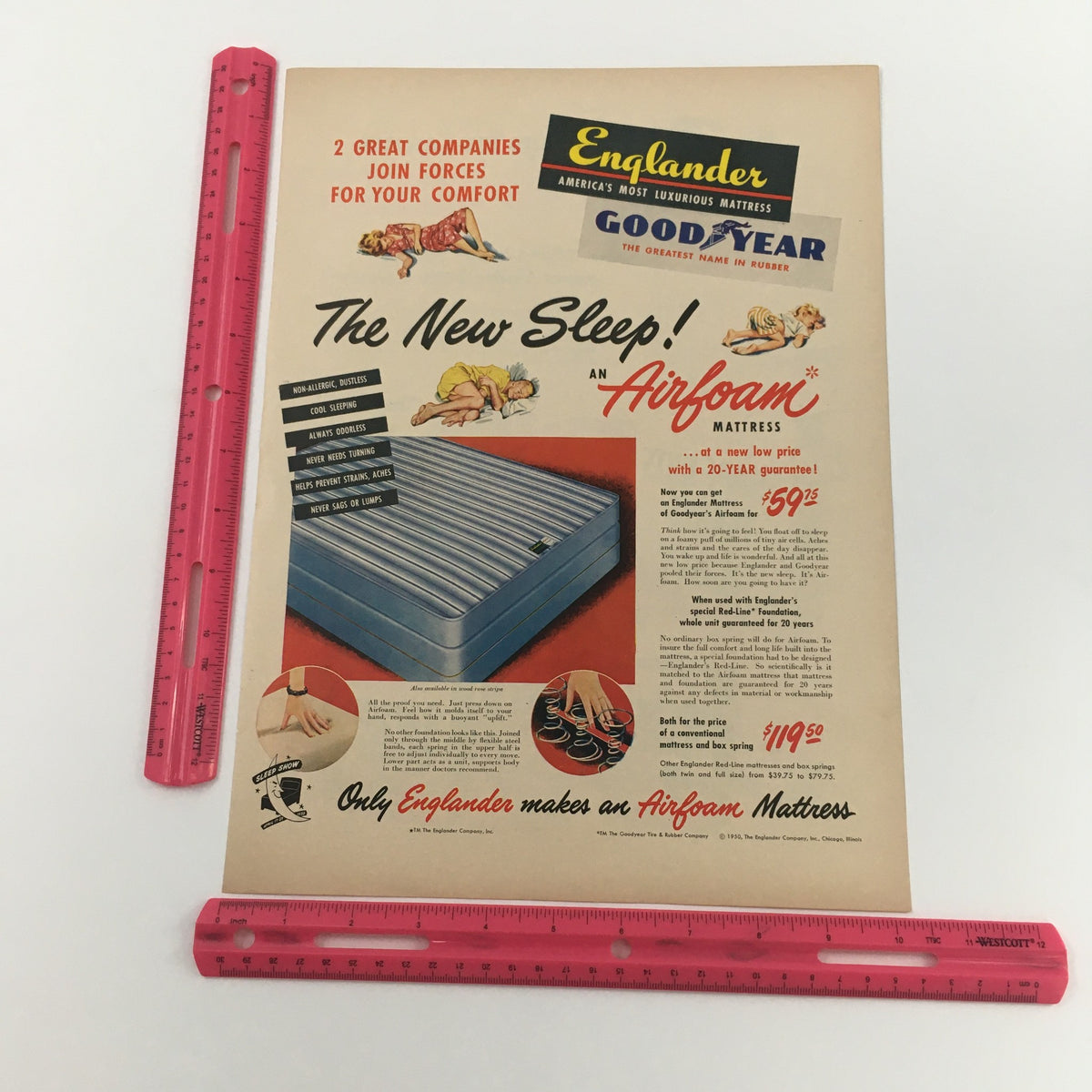 Detailed view of the 1950 Goodyear Englander Airfoam Mattress Vintage Print Ad with a ruler for size reference, emphasizing its nostalgic design and marketing elements.