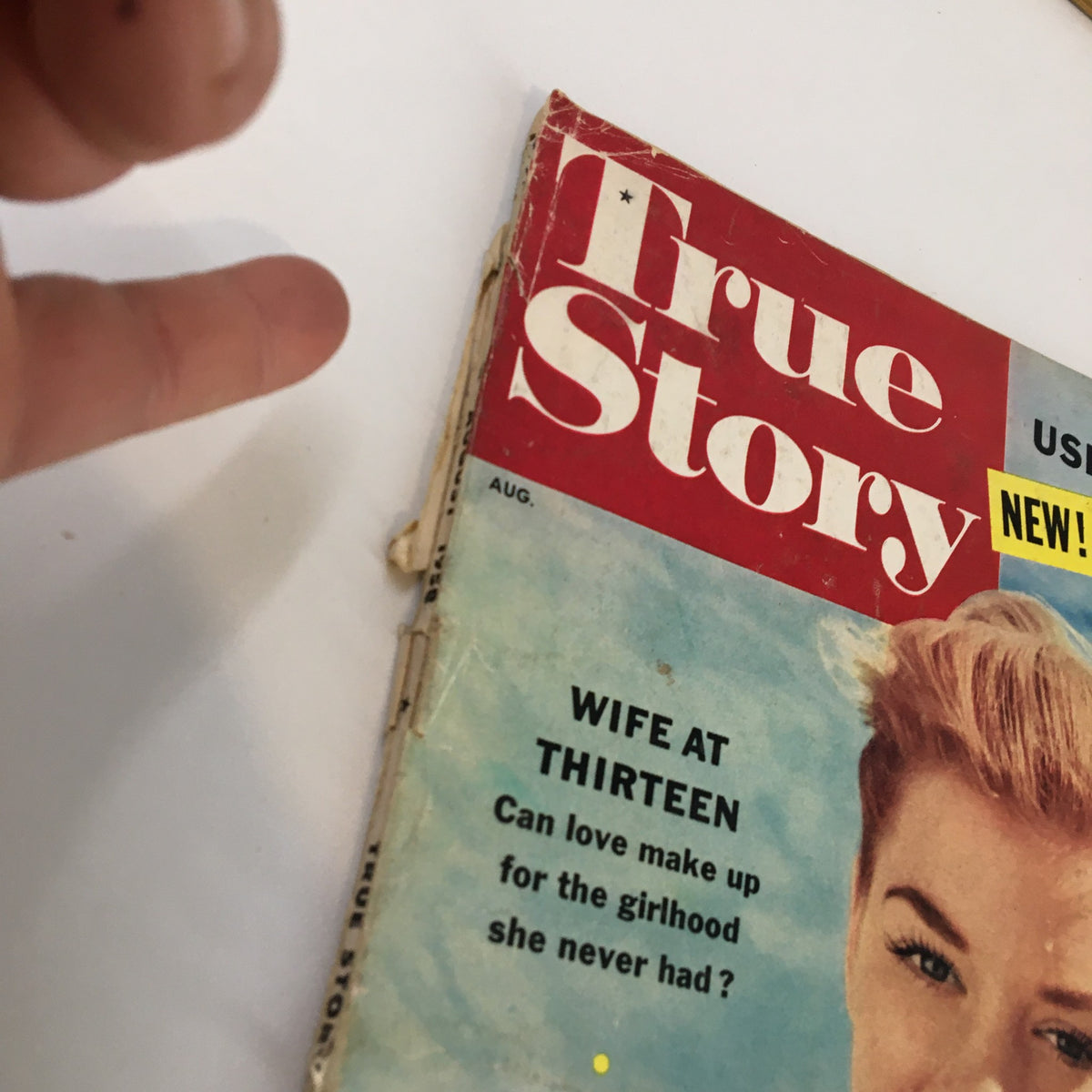 Close-up view of the cover of VTG True Story Magazine August 1958, highlighting the title and key stories including 'Wife at Thirteen' and hypnosis.