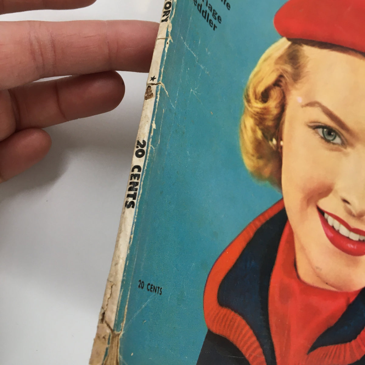 Side view of the VTG True Story Magazine from October 1953 displaying the spine with minor wear and the price '20 cents' visible.