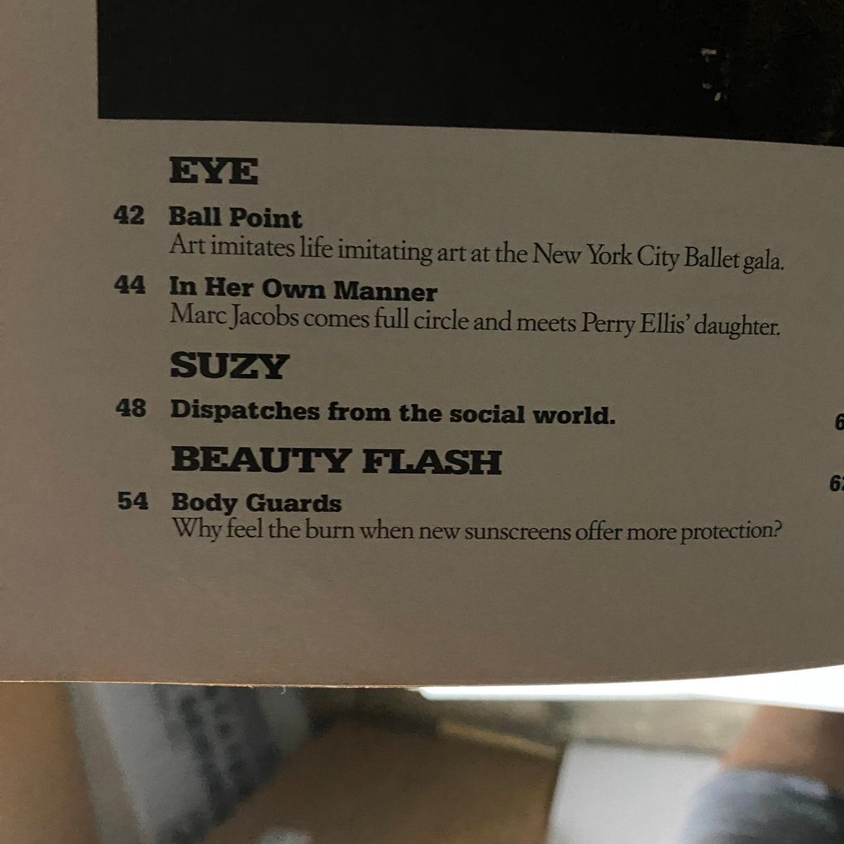 Inside content page of W Magazine July 2001 featuring articles such as 'EYE - Ball Point' and 'BEAUTY FLASH' discussing art and skincare.