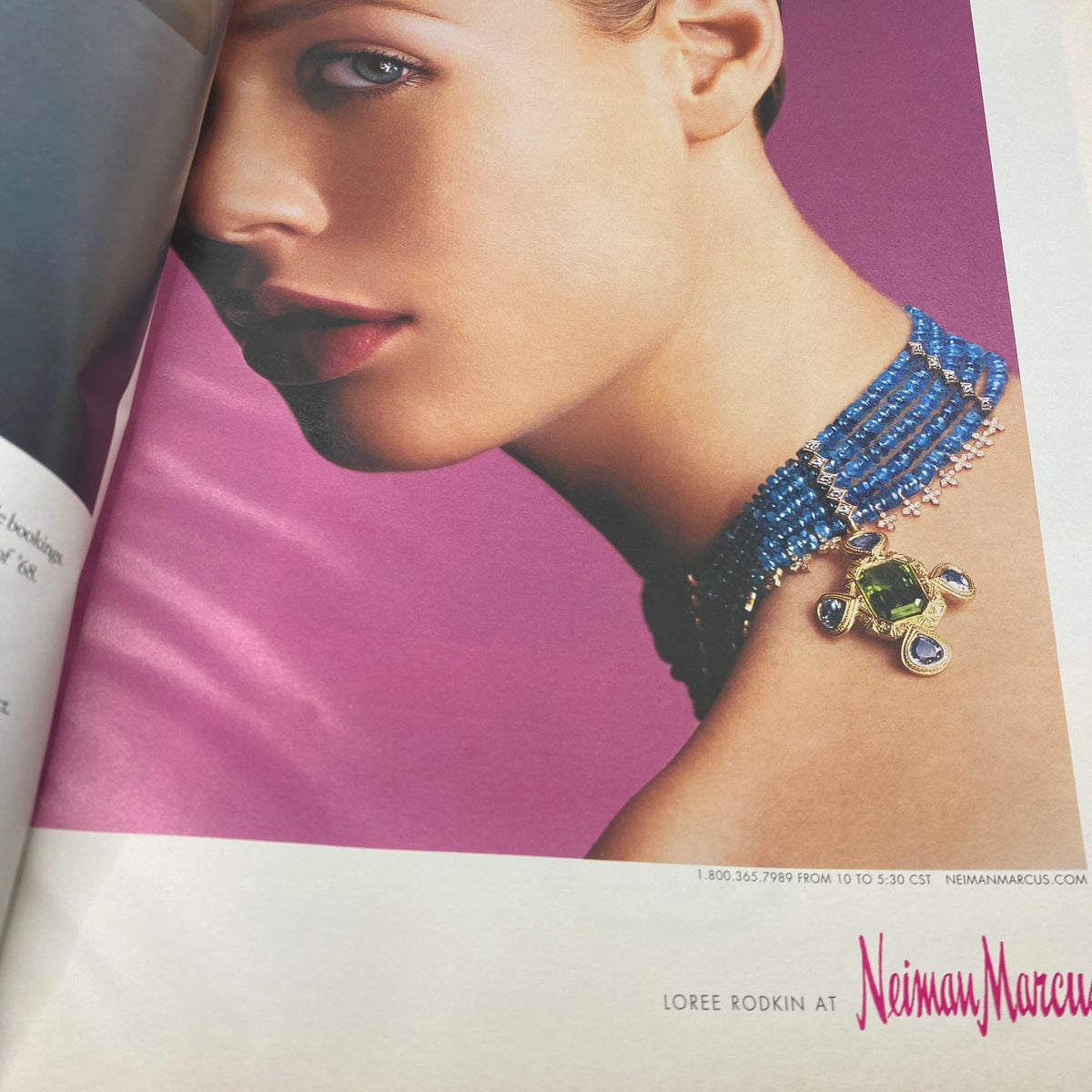 Close-up of a model showcasing a stunning necklace in W Magazine April 2002, featuring businesswoman Lauren Bush on the cover.