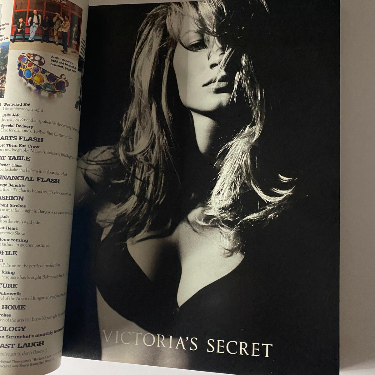 Victoria's Secret advertisement featuring a glamorous black-and-white image of a model with long hair, showcasing the brand's fashion, from the W Magazine September 2001 issue featuring Golden Gwyneth Paltrow on the cover.