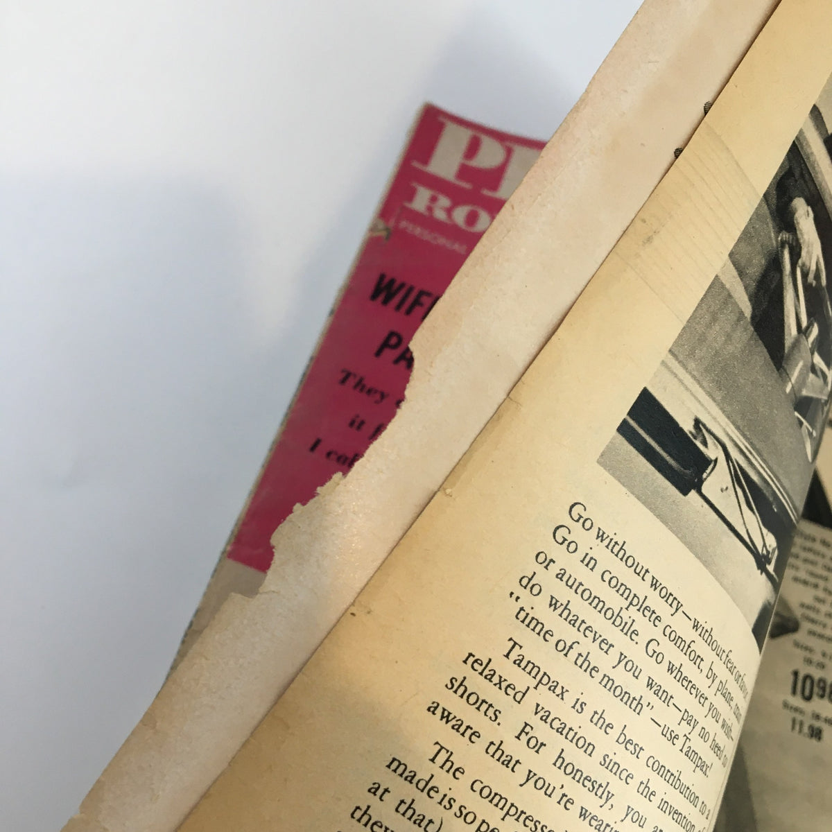 Close-up of the spine of Personal Romances Magazine September 1956, highlighting wear and a visible tear, indicative of vintage condition.