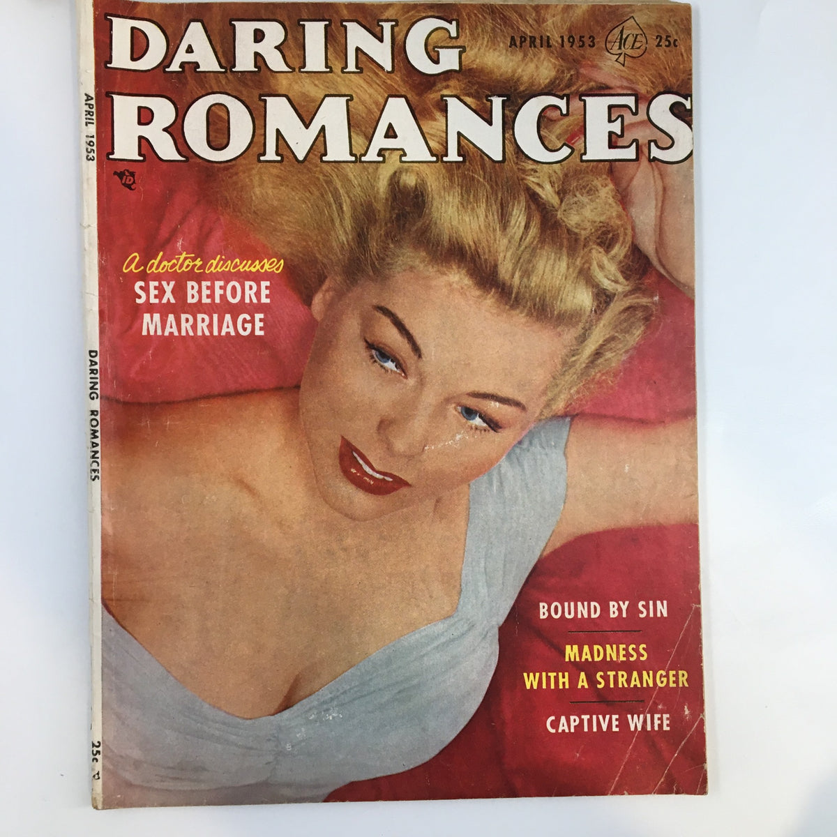 VTG Daring Romances Magazine April 1953 - Cover featuring captivating blonde woman, highlighting features such as 'Madness with A Stranger' and 'A doctor discusses Sex Before Marriage'.