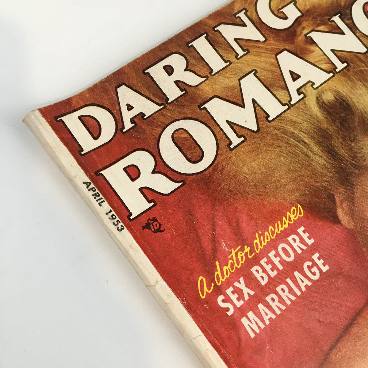 VTG Daring Romances Magazine April 1953 - Detail of magazine corner featuring title and date, emphasizing vintage appeal and historical context.