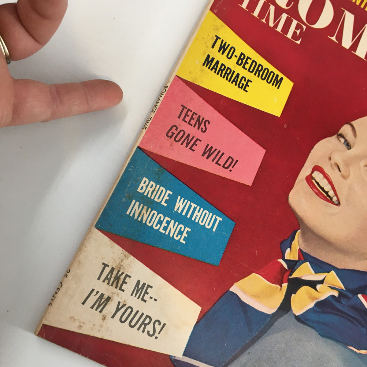 Close-up of the cover of Romance Time Magazine from November 1956, highlighting text sections like 'Two-Bedroom Marriage', 'Teens Gone Wild!', and 'Bride Without Innocence'.