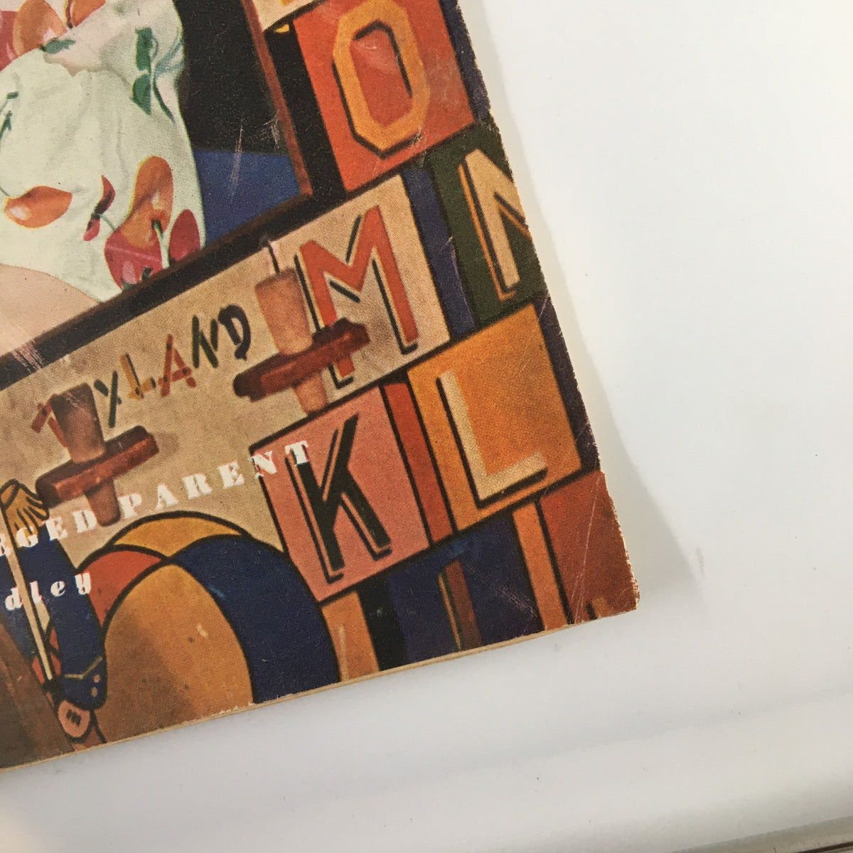 Close-up of the title section on the cover of VTG Household Magazine September 1947, emphasizing 'I'm The Underprivileged Parent' and pastel color blocks.