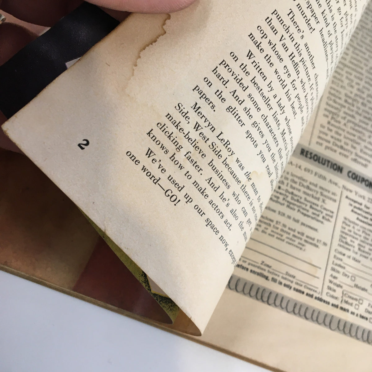 Inside view of VTG McCall's Magazine January 1950, displaying pages with text and advertisements, offering a glimpse into the magazine's content.