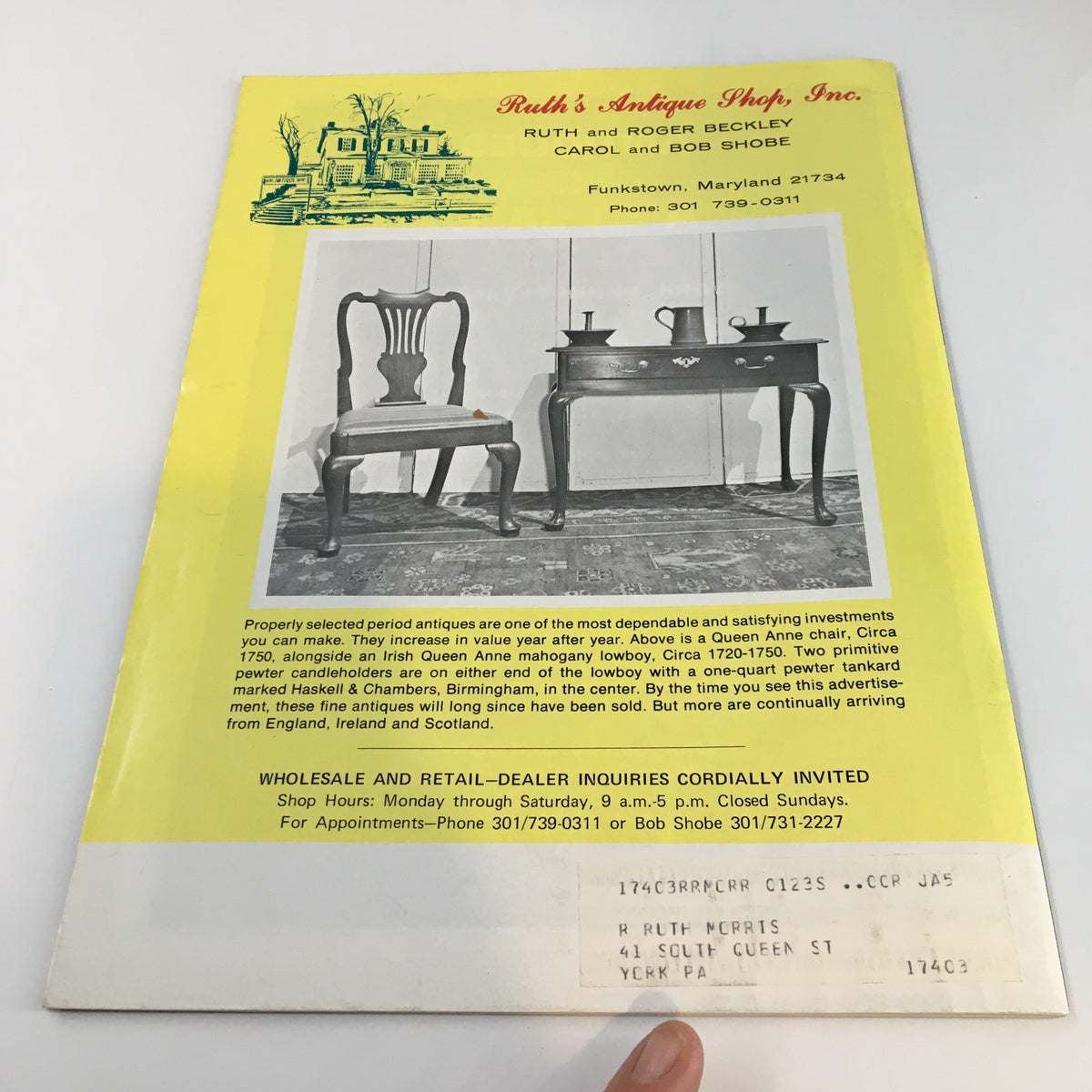Back cover of the June 1973 'Spinning Wheel' magazine, advertising Ruth's Antique Shop with images of period antiques and contact information.