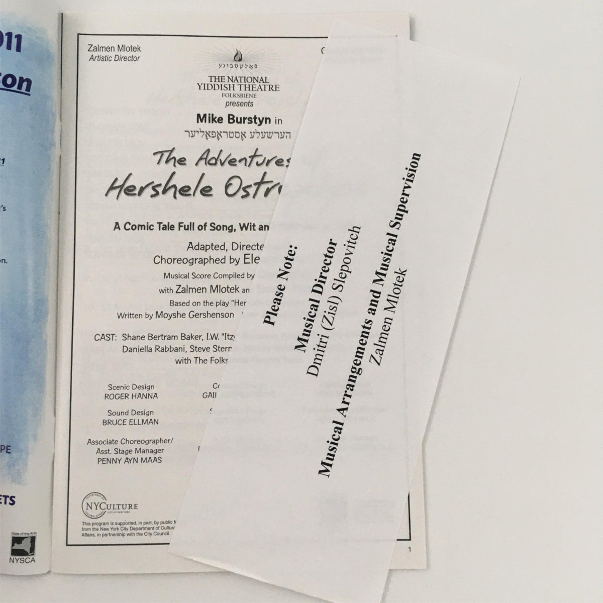 Insert from the program for 'The Adventures of Heshele Ostropolyer', noting musical direction and supervision information by Daniil Sepporich and Zalmen Mlotek.
