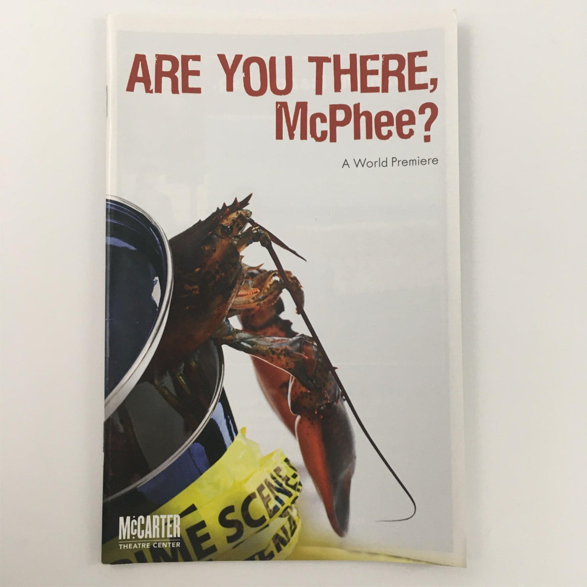 Cover of 'Are You There, McPhee?' featuring a lobster in a can, promoting the 2012 world premiere at McCarter Theatre directed by Sam Buntrock.