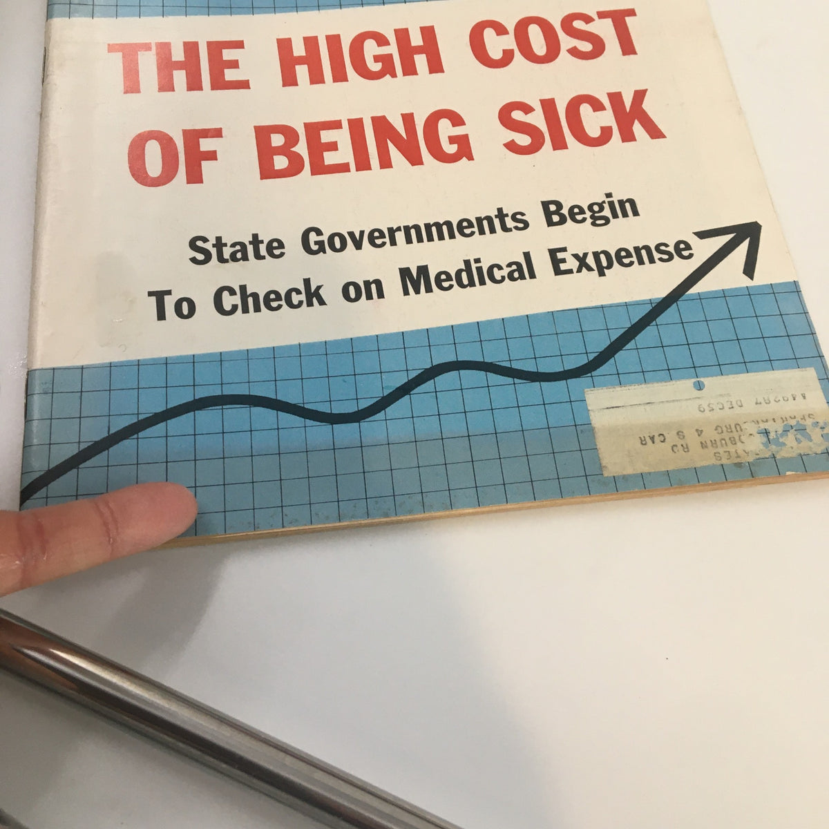 Cover of the US News & World Report Magazine from March 16, 1959, featuring the headline 'The High Cost of Being Sick' with a graphical representation of rising medical expenses and a brief description about government oversight on medical costs.