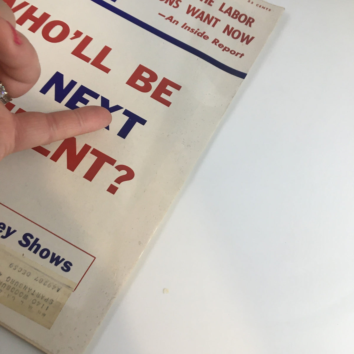 Close-up view of the front cover of US News & World Report Magazine from February 27, 1959, showing the title 'What The Labor Unions Want Now' and emphasizing the question 'WHO'LL BE THE NEXT PRESIDENT?' with a hand pointing at the text.