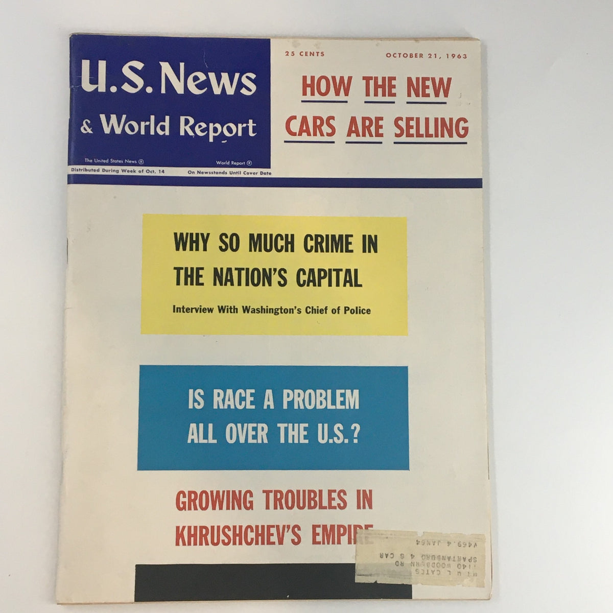 U.S. News & World Report Magazine cover from October 21, 1963, featuring the headline 'How The New Cars Are Selling', along with articles on crime in the nation's capital, racial issues, and Khrushchev's empire.