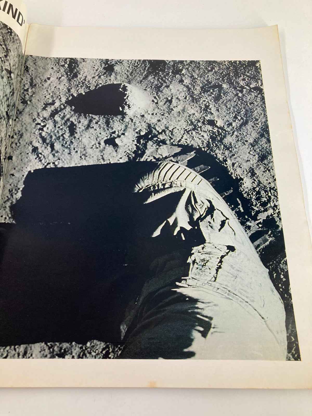 Footprint on the lunar surface captured in the VTG Life Magazine 1969 To The Moon and Back, illustrating the historic Apollo moon landing.