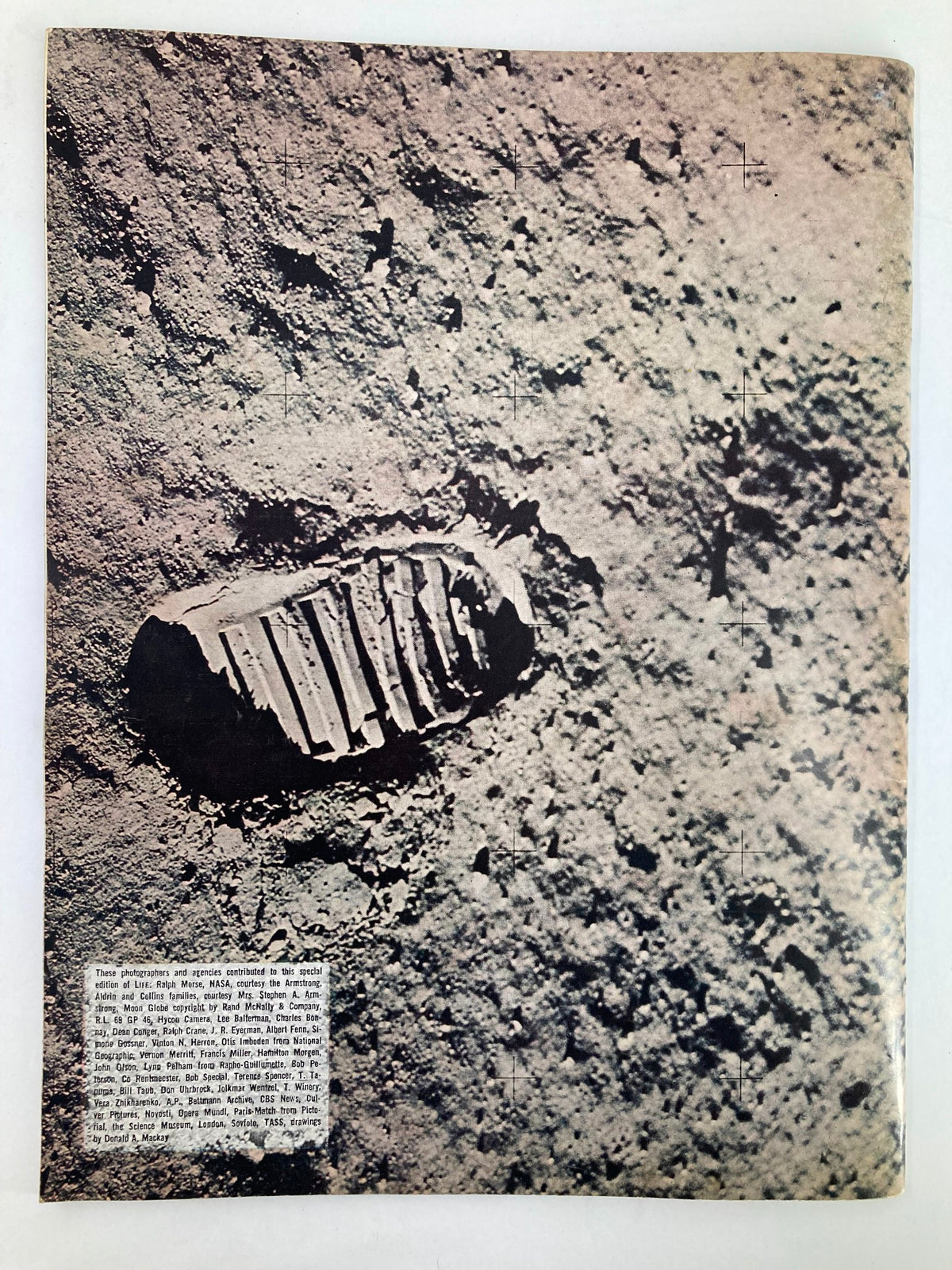 Photograph of a moon footprint from VTG Life Magazine 1969 To The Moon and Back, highlighting the monumental achievement of the Apollo mission on lunar soil.