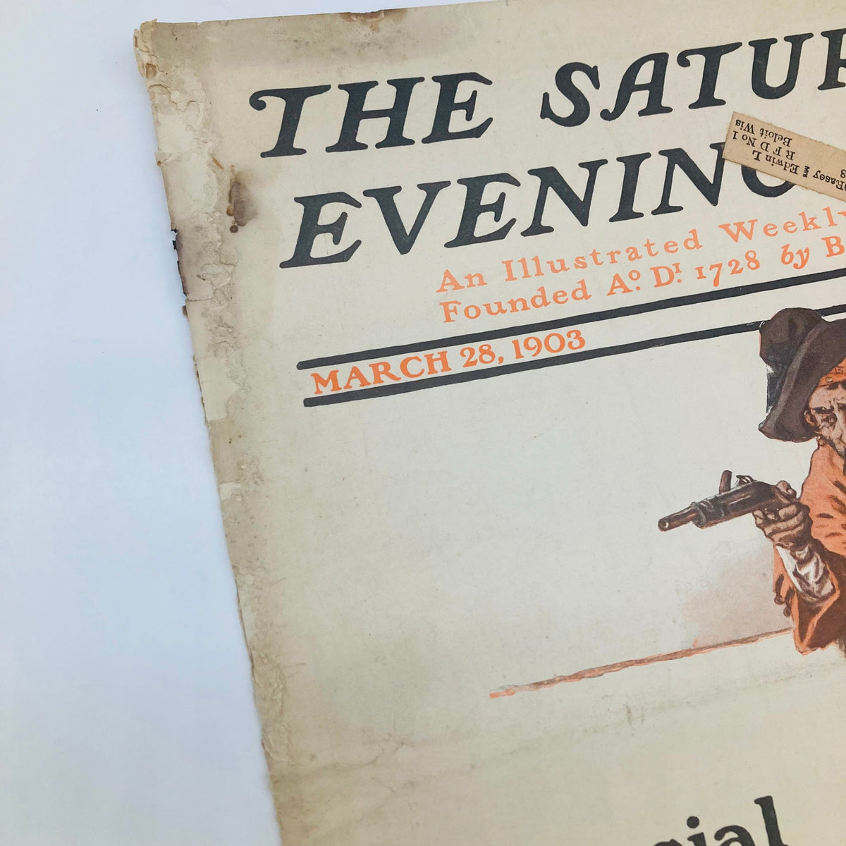 Close-up of the Saturday Evening Post Illustrated Cover March 28 1903 detailing aged edges and illustrations with vintage appeal.