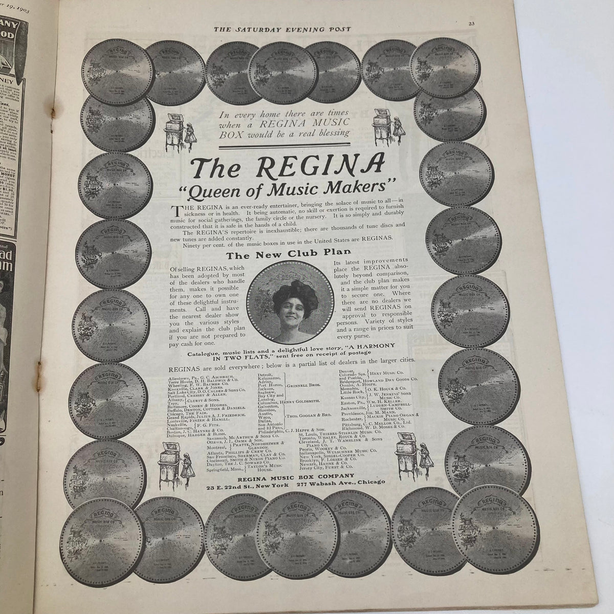 Advertisement page from the Saturday Evening Post Illustrated Cover from September 19, 1903, promoting 'The Regina - Queen of Music Makers' with decorative borders featuring musical imagery.