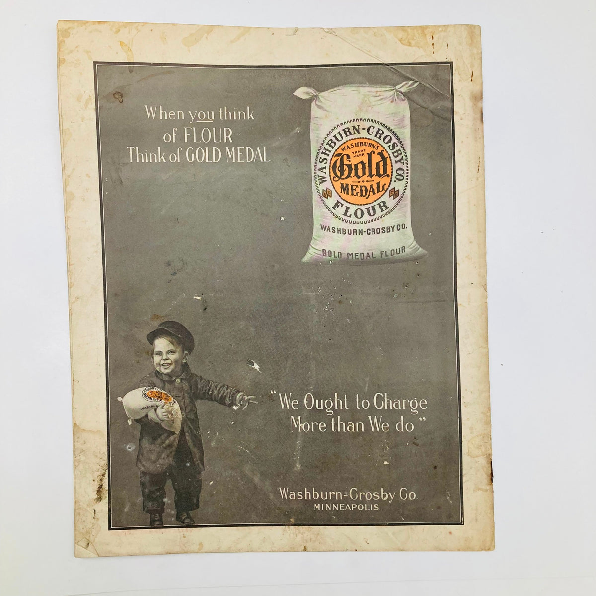 Vintage advertisement for Washburn-Crosby Gold Medal Flour featured on the back cover of the Saturday Evening Post December 26 1903, including a young boy holding a flour sack.