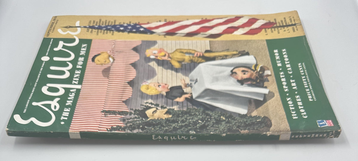 Esquire Magazine September 1942 angled view, highlighting the iconic cover art with cartoon characters and American flag, reflecting wartime culture and humor.