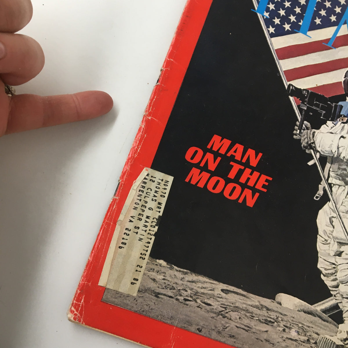 Close-up view of VTG Time Magazine July 25 1969 featuring Neil Armstrong on the Moon, highlighting the cover details and the label on the corner.
