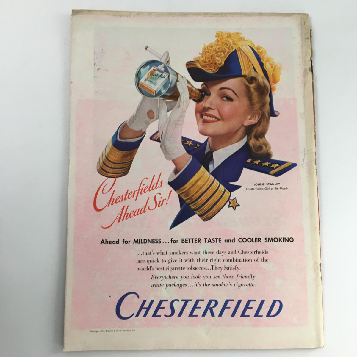 Vintage advertisement from the back cover of Newsweek Magazine April 14, 1941, featuring a smiling woman in a military-style uniform promoting Chesterfield cigarettes with the slogan 'Chesterfields Ahead Sir!'