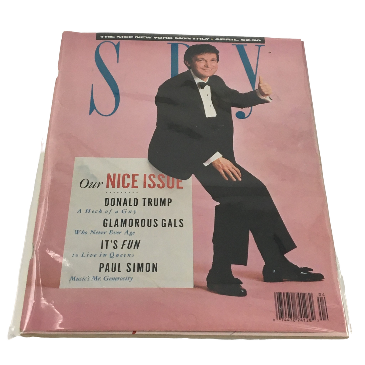 Cover of Spy Magazine, April 1988, featuring Donald Trump and Paul Simon with the headline 'Mr. Generosity,' with a minimalist, no-label design.