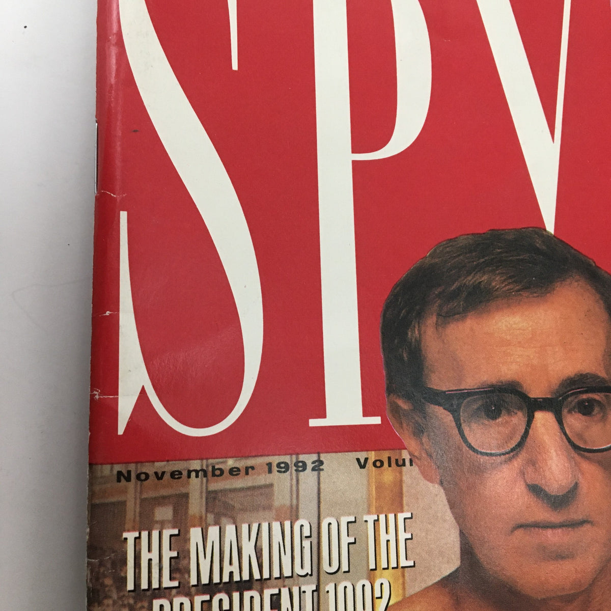Close-up of Spy Magazine November 1992 cover showcasing Woody Allen, highlighting the magazine title and the subtitle 'The Making of the President 1992'. This vintage magazine reflects early 90s pop culture.