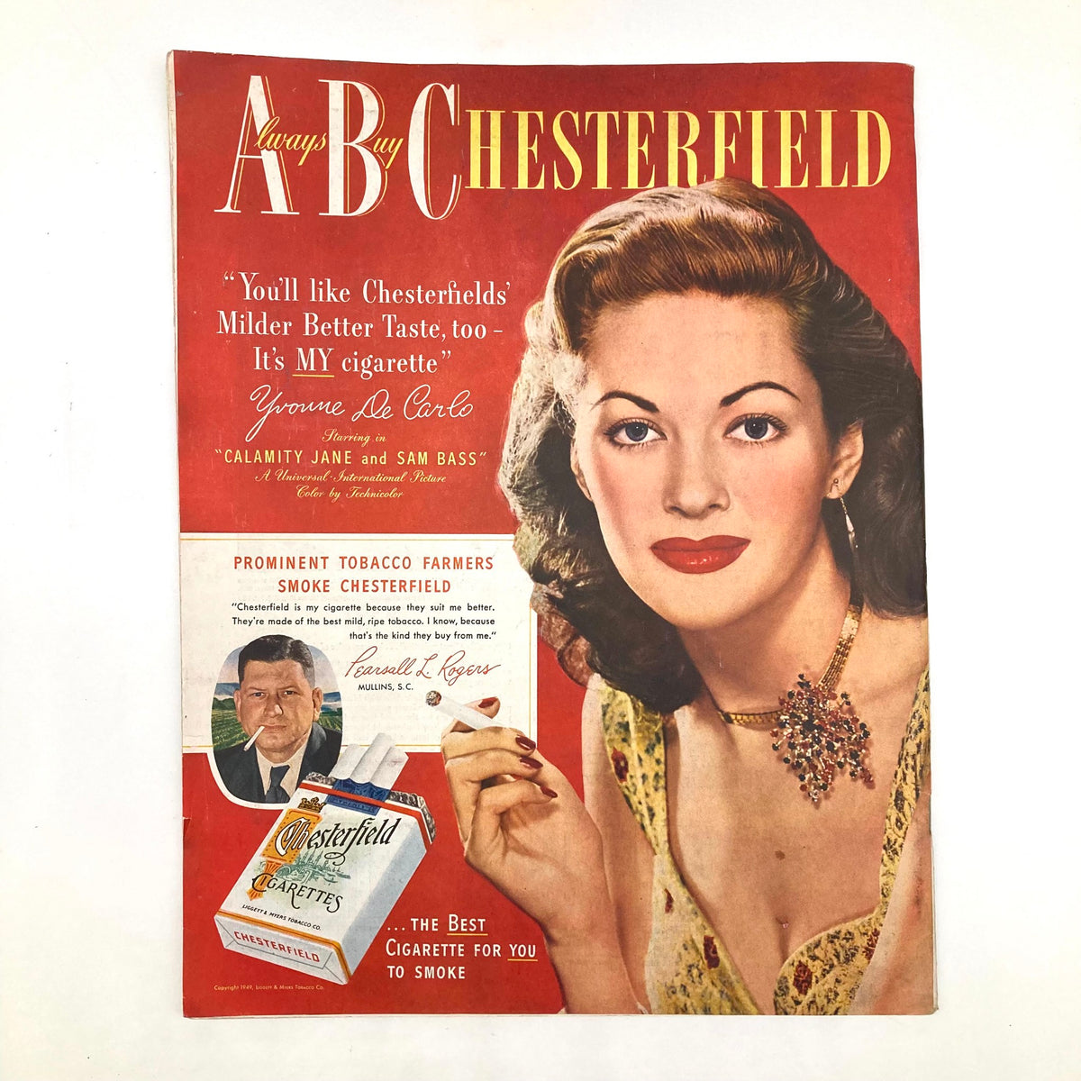 Cover page of Chesterfield cigarettes advertisement featuring a glamorous woman and prominent tobacco farmers, from Saturday Evening Post Magazine August 27 1949.