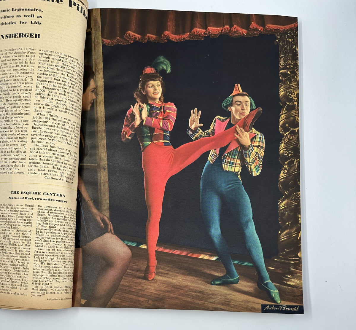 Esquire Magazine August 1944 features a vibrant photo of two performers in colorful costumes, showcasing a playful scene that embodies the magazine's artistic style.