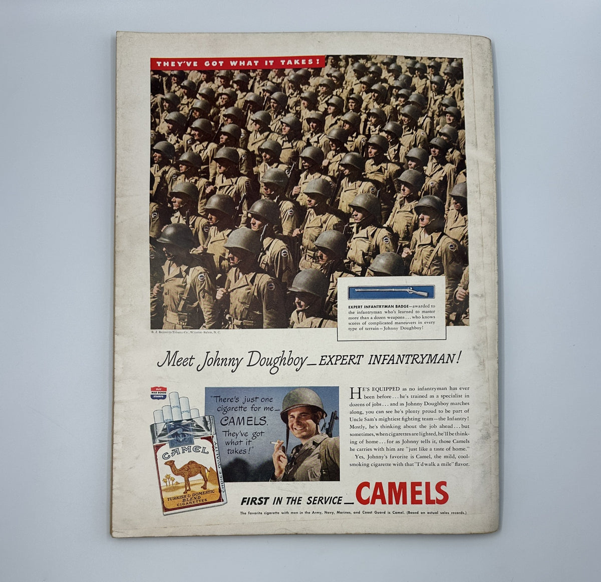 Esquire Magazine August 1944 includes an advertisement on the back cover showcasing soldiers in formation, promoting Camel cigarettes with the tagline 'They've got what it takes!' reflecting wartime themes.