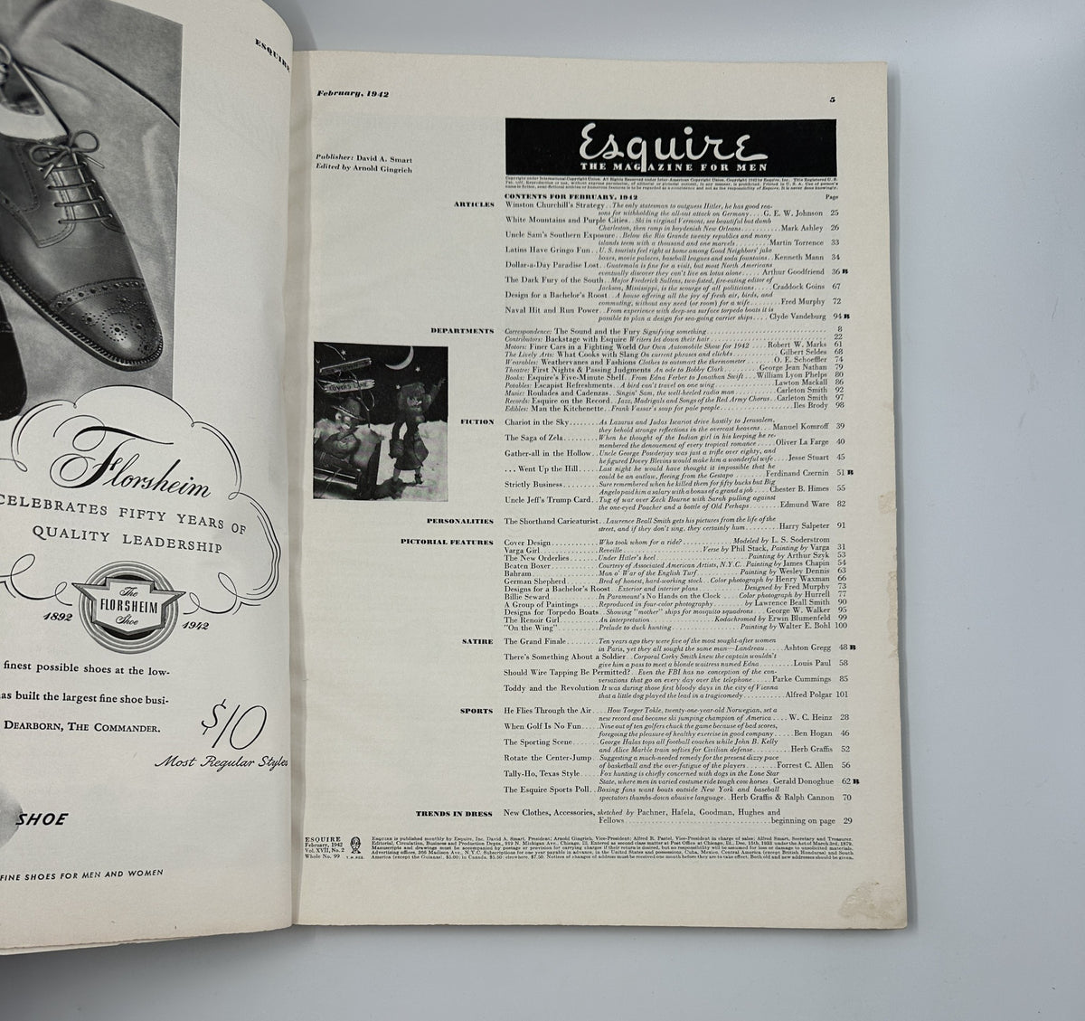 Page from Esquire Magazine February 1942 featuring advertisements and article directory, showcasing the magazine's historical context and vintage design.